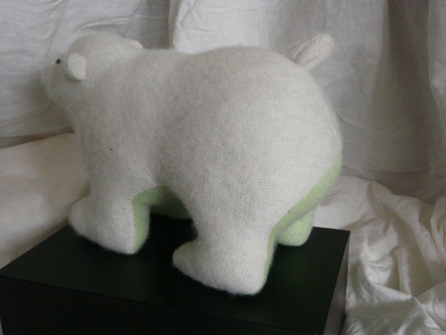 Polar bear with green tummy